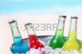 /album/fotogaleria/a20281136-coloridas-bebidas-gaseosas-frias-en-botellas-de-vidrio-sin-etiqueta-que-se-colocan-en-un-recipiente-jpg/
